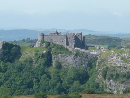 far away view of battlements on a cliff